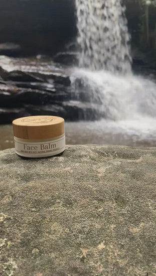 Face balm made by Earth n Spirit out at a natural waterfall video.